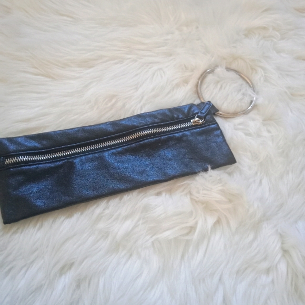 Black wristlet with zipper and medal ring for holding